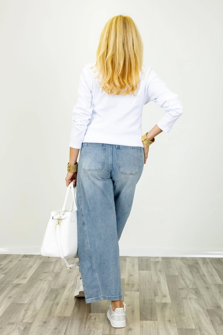 Jeansy damskie Pratameno light denim blue fason banana jeans balonowe przeszycia Antaresa.