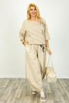 Spodnie balloon z apaszką w pasie przeszyciami na dole luźną nogawką i kieszeniami Podenzana beżowe