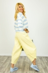 Spodnie jeansowe balloon z kieszeniami i gumą w pasie Dolceacqua pastelowo żółte