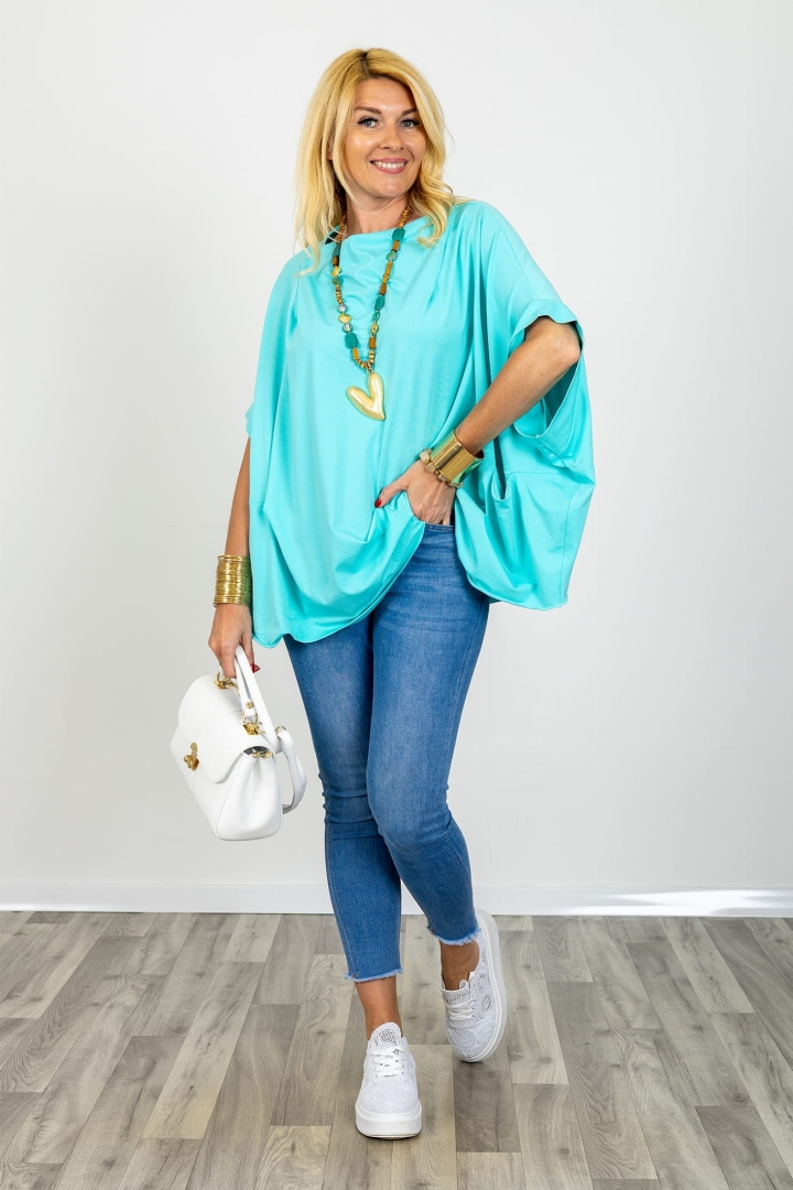 Bluzka mega oversize z rękawem kimono dekoltem woda i kieszonkami na przodzie Montesilvano lazurowa