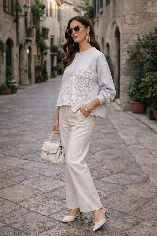 Bluza oversize damska Arignano szara z ażurowymi kołami przód okrągły dekolt rękaw długi