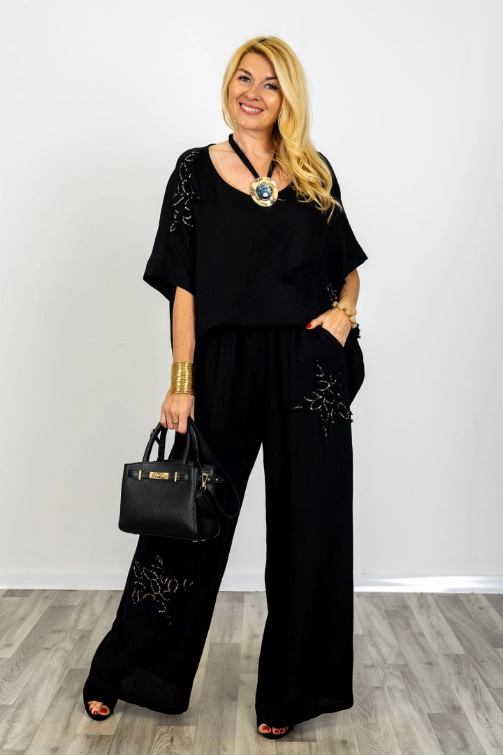 Lniane spodnie palazzo na gumce z troczkami i ażurowymi wstawkami z cekinami Dogliana  czarne