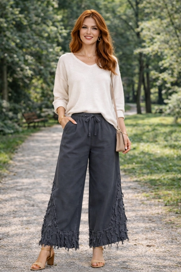 Spodnie z szeroką nogawką gumka w pasie kieszenie boczne i doszywany pas z dekoracyjnie postrzępionej tkaniny Giardinello grafitowe