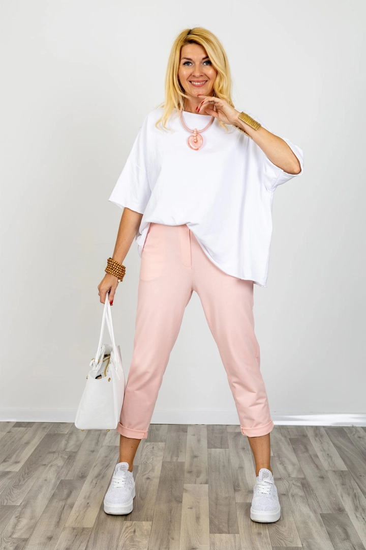 Spodnie dresowe z asymetrycznym przeszyciem i ozdobną patką z tyłu Ururi pudrowo różowe