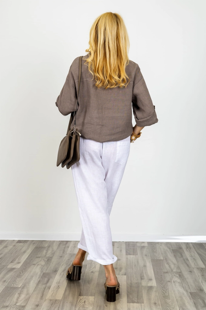 Spodnie jogger lniane na gumce z troczkami wysokim stanem dwiema kieszeniami z przodu jedną z tyłu Fiordimonte białe