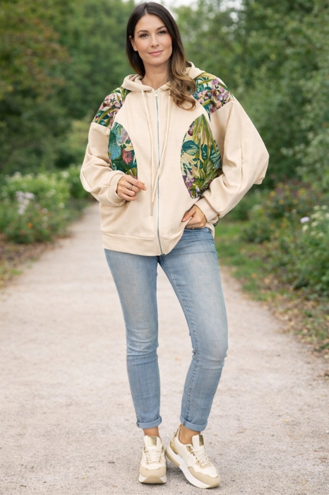 bluza damska beżowa oversize z kapturem na zamek z kieszeniami i kwiatowym printem Ribottoli
