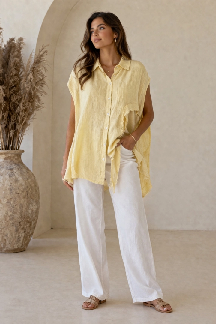 koszula damska lniana żółta waniliowa oversize z falbankami i asymetrycznym dołem na guziki Frassanito