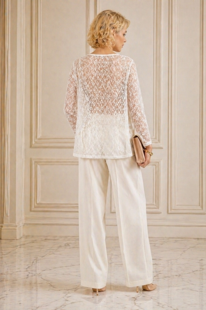 Bluzka damska koronkowa biała elegancka z falbanką i długim rękawem Chambave