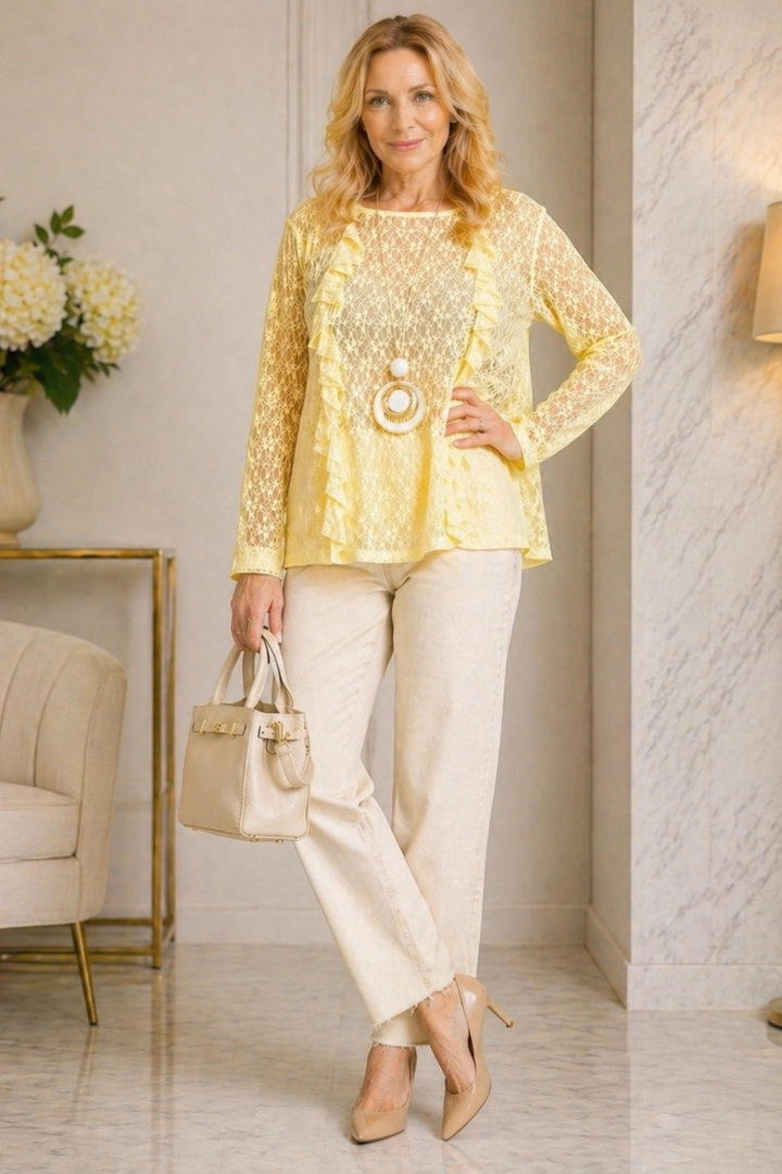 Bluzka damska koronkowa pastelowy żółty elegancka z falbanką i długim rękawem Chambave