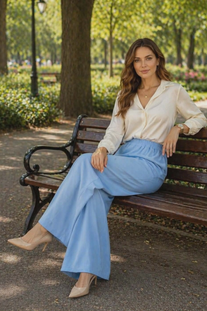 Spodnie damskie szerokie kuloty błękitne eleganckie wysoki stan Capoiale