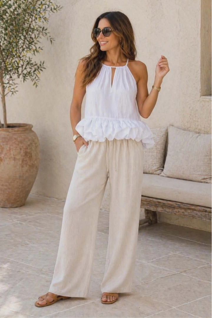 bluzka damska biała halter top na ramiączkach z falbanką rozkloszowany dół lekka elegancka Centegnano