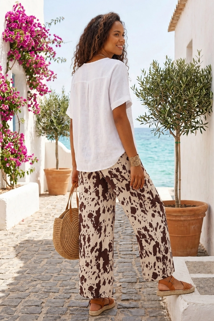 Spodnie wide leg beżowo-brązowe w zwierzęcy print z wysokim stanem Collebeato