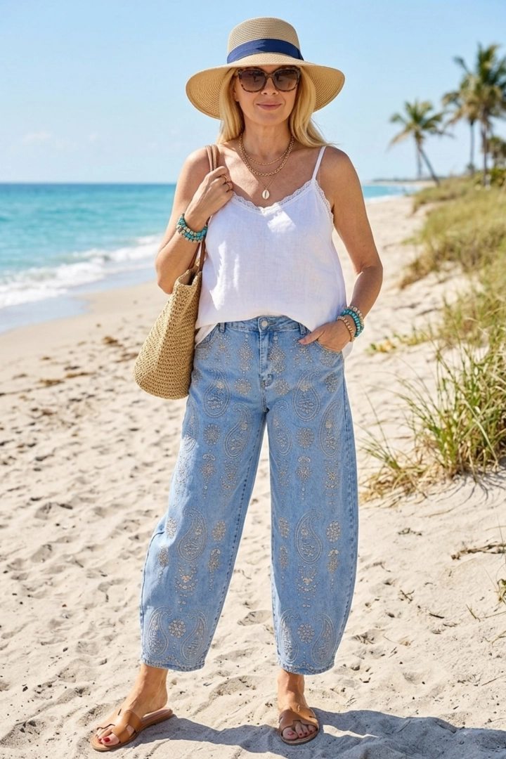 Spodnie jeansowe balloon fit damskie denim blue z wyszywanym wzorem paisley Gionzana