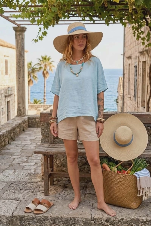 Lniana bluzka damska błękitna oversize z rękawem kimono i przeszyciem na plecach Sannitico