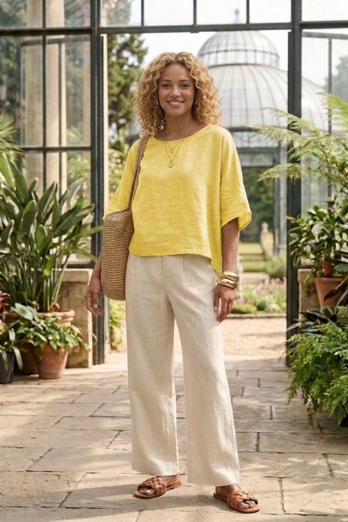 Pastelowa żółta bluzka lniana oversize z krótkim rękawem kimono i przeszyciem na plecach Sannitico