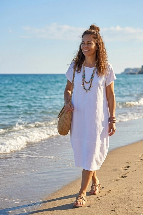 Oversize sukienka midi biała z krótkim rękawem i kieszeniami plus size Valdaora