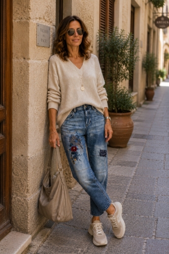 Denim blue spodnie slim fit kwiaty cekiny naszywki Turate