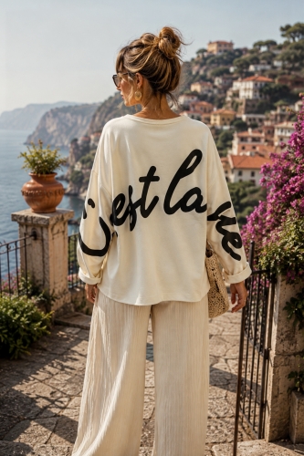 Beżowa bluza oversize z napisami i obniżoną linią ramion Casafort